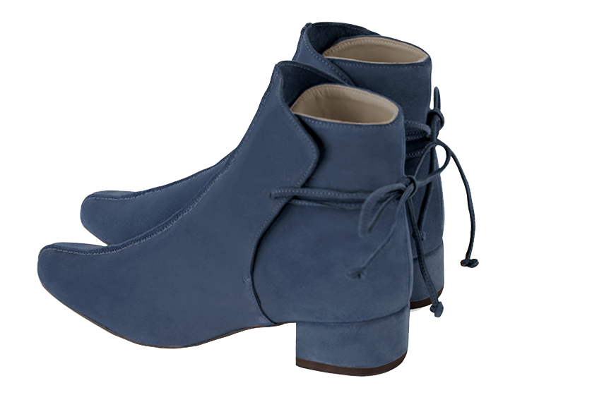 Denim blue women's ankle boots with laces at the back. Round toe. Low block heels. Rear view - Florence KOOIJMAN